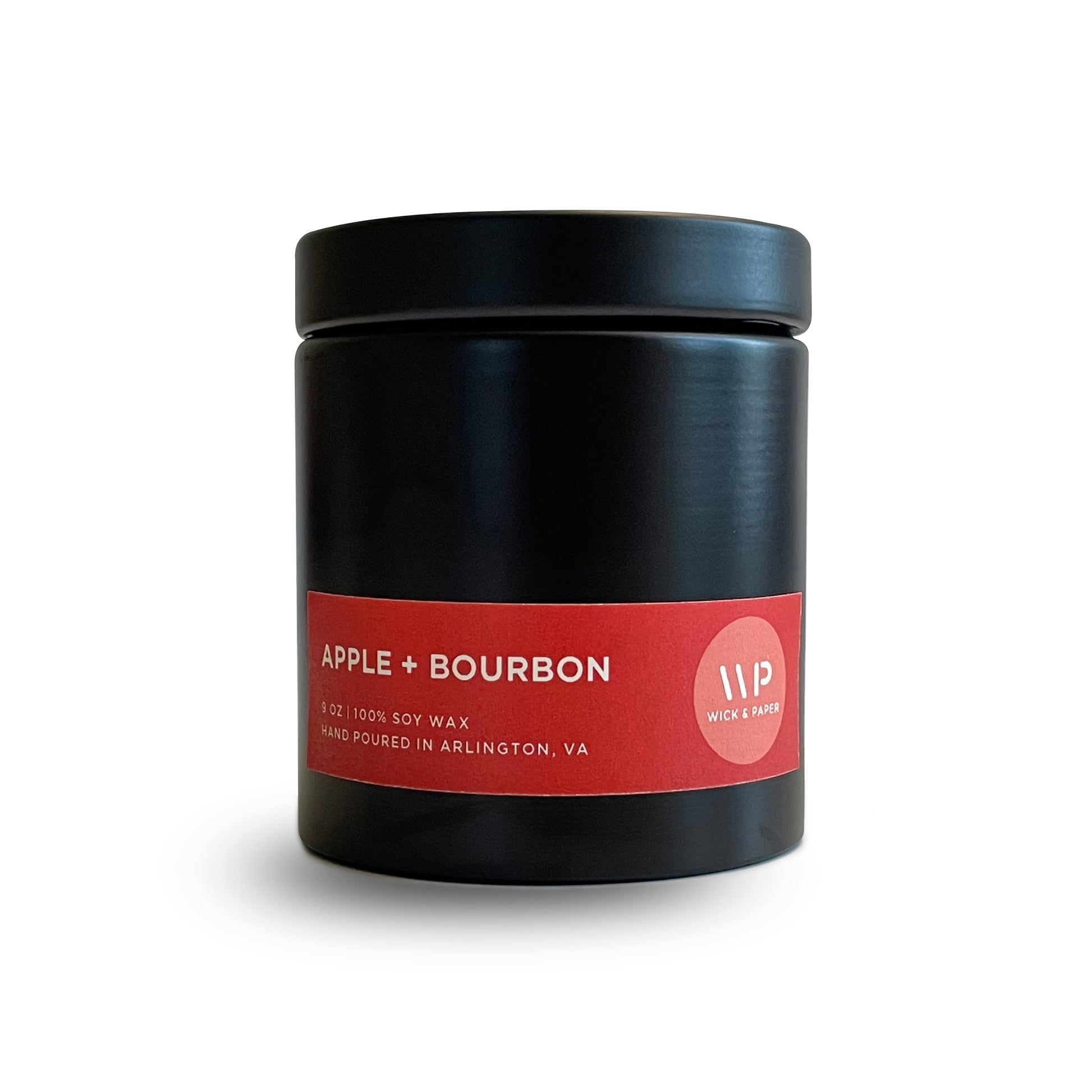 apple and bourbon scented candle by wick and paper