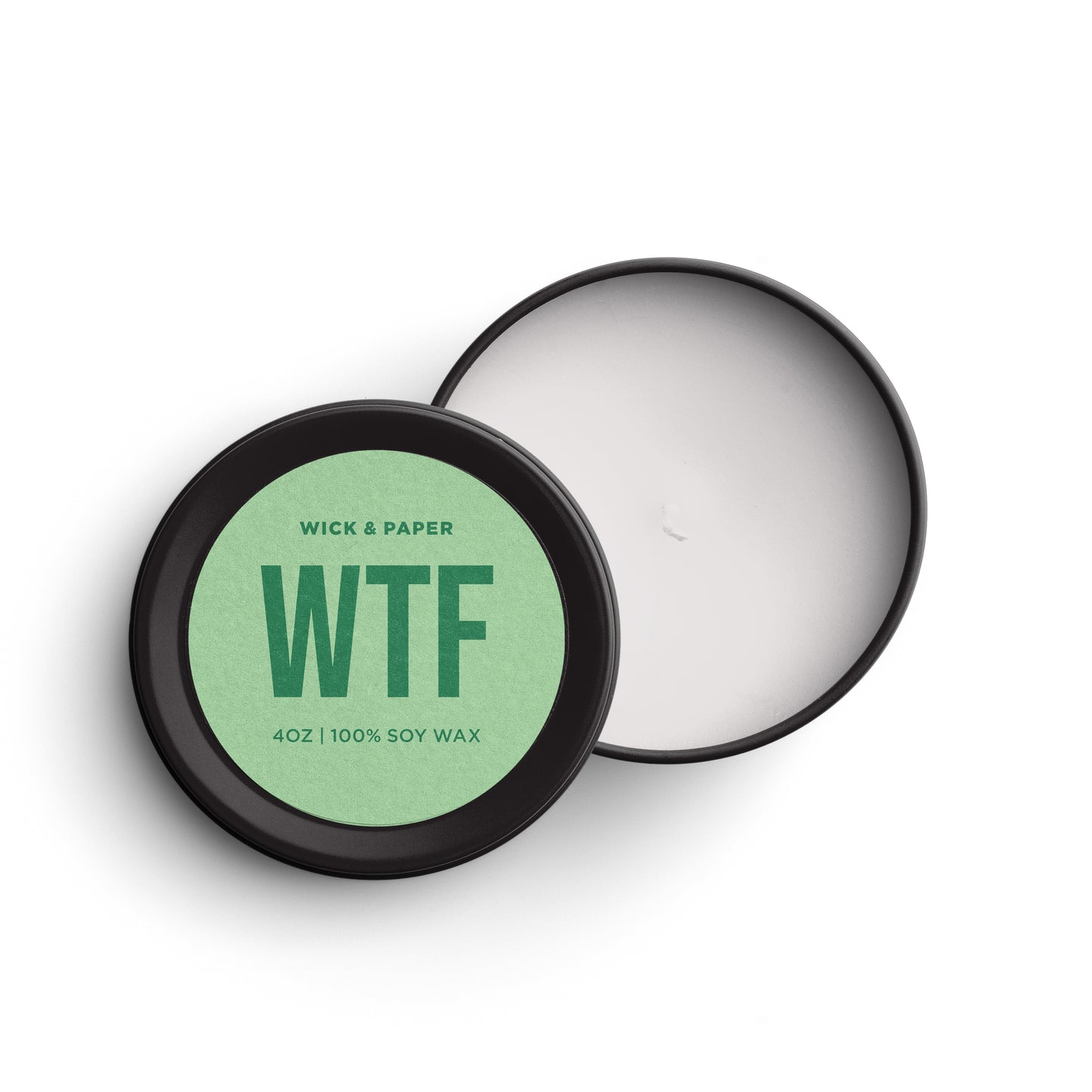 4 oz soy wax candle with “WTF” design and green label, by Wick and Paper.
