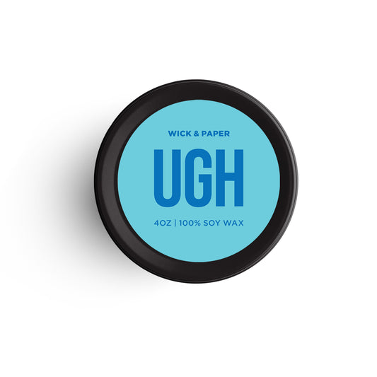 4 oz soy wax candle with “UGH” design and blue label, by Wick and Paper.