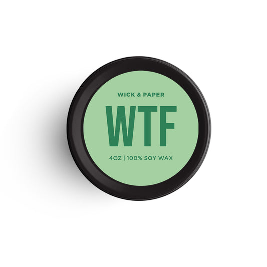 4 oz soy wax candle with “WTF” design and green label, by Wick and Paper.
