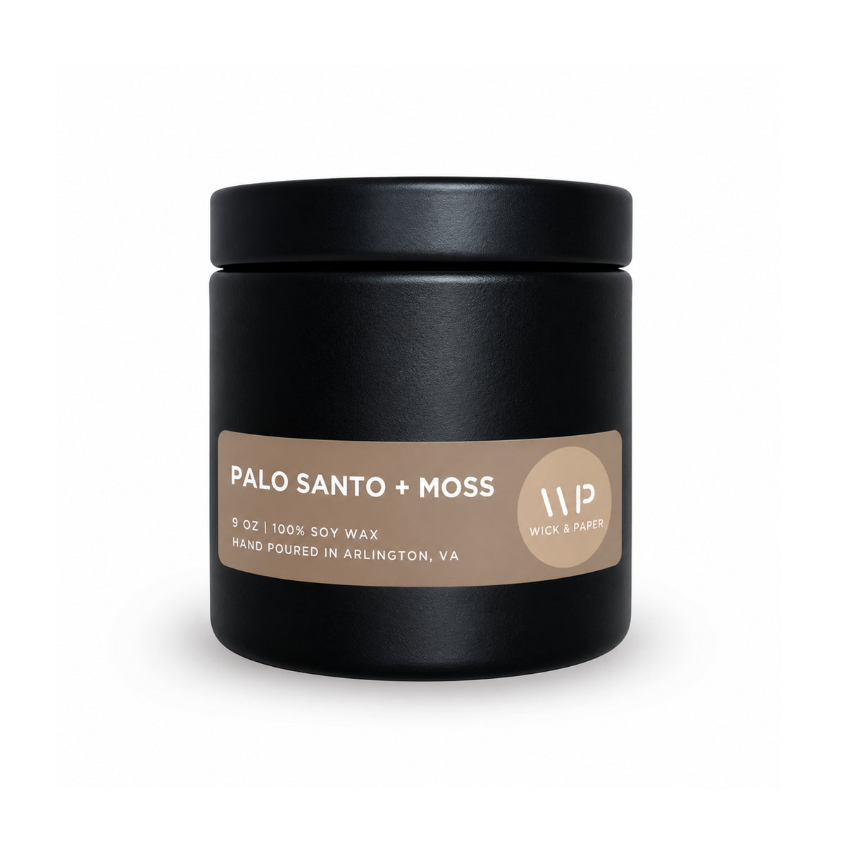 Palo Santo and Moss 9 oz soy candle in a black tin by Wick & Paper